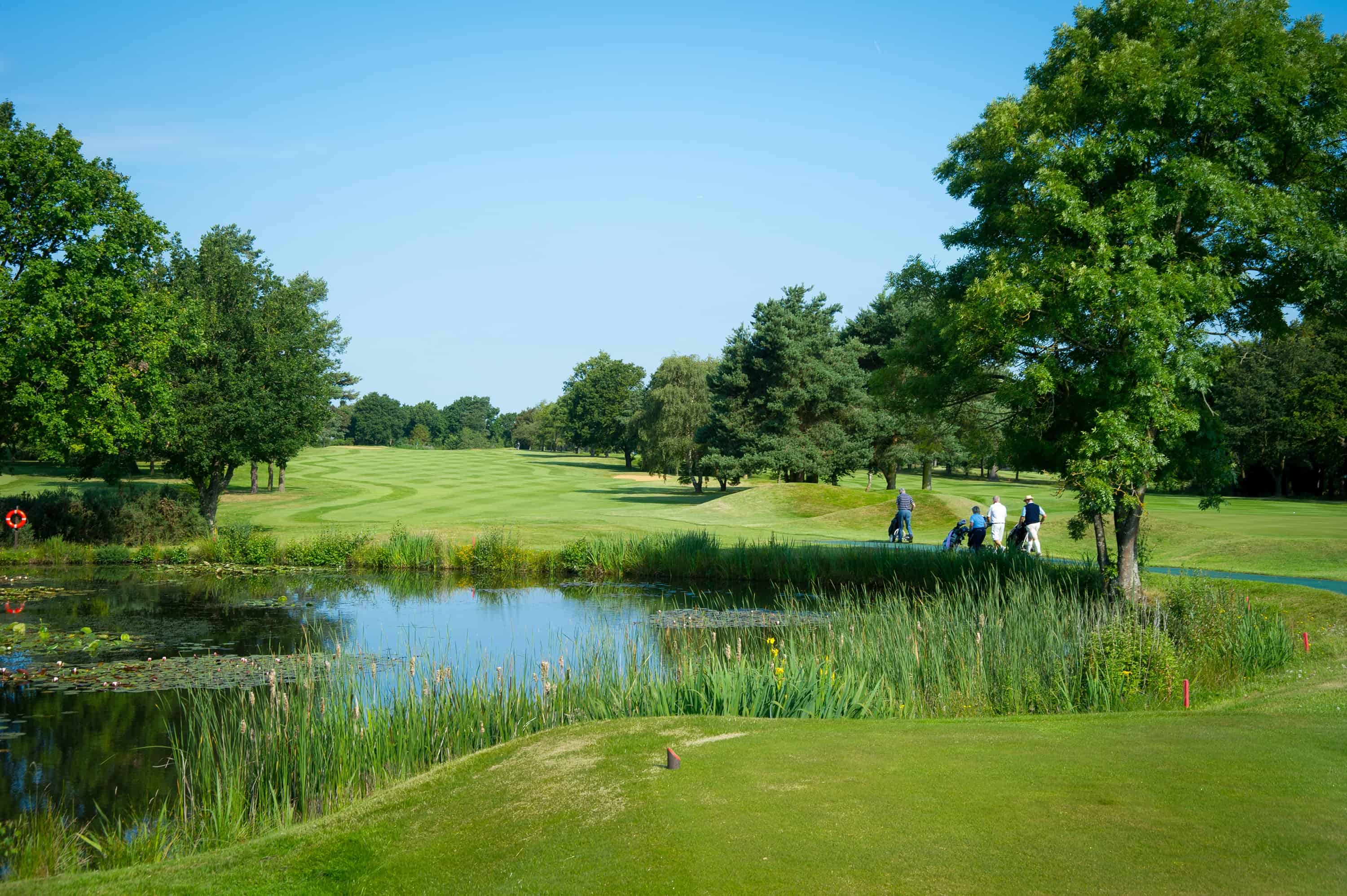 Lake-view-with-golfers-walking-16th-High-1